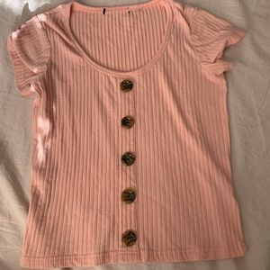 A light, baby pink shirt